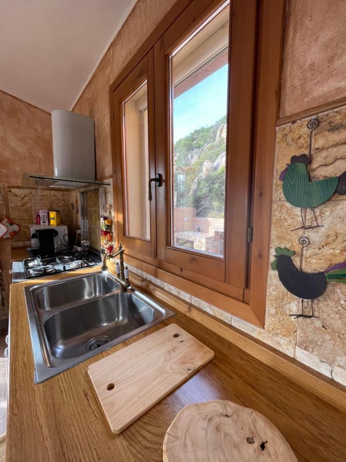 Villa Rocce Rosse คอสตาพาราดีโซ ภายนอก รูปภาพ
