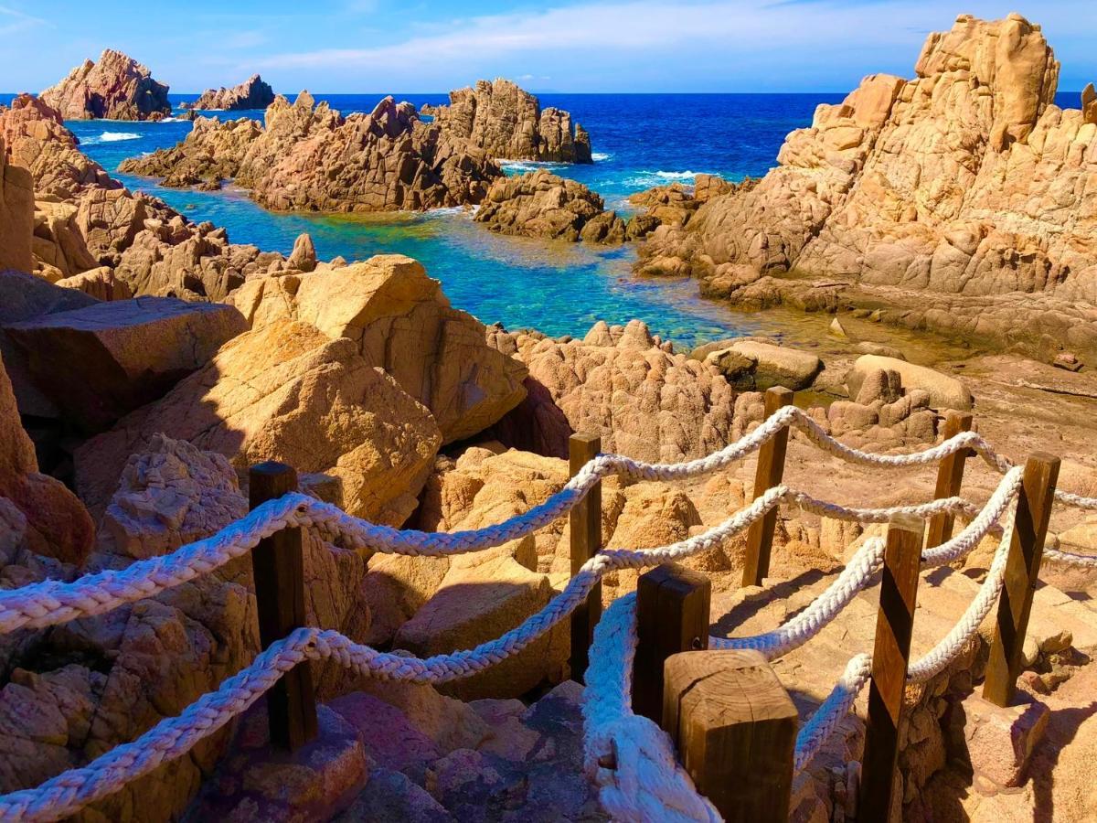 Villa Rocce Rosse คอสตาพาราดีโซ ภายนอก รูปภาพ